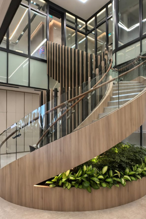 Sytwo interior — curved timber staircase